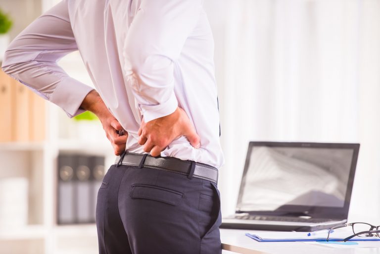 Back ache, spine pain from workplace, personal injury compensation Wakefield